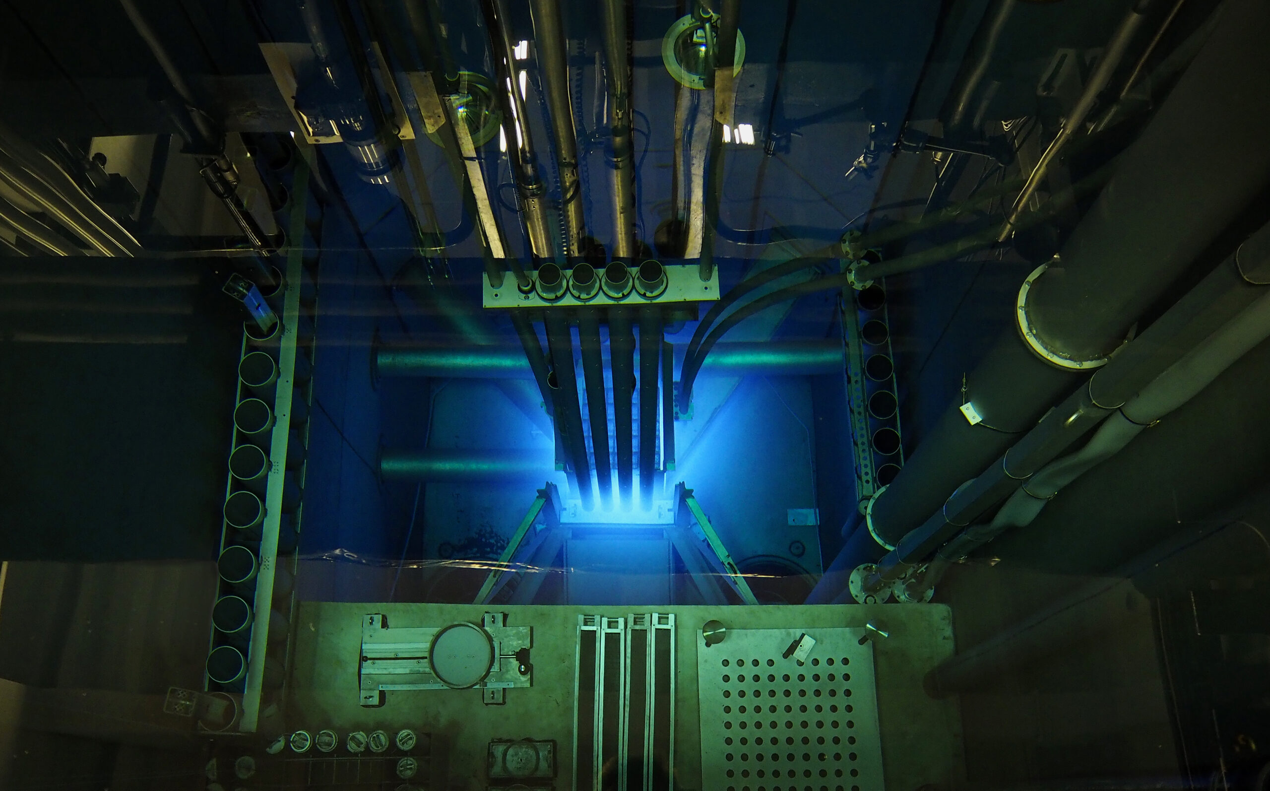 A nuclear reactor glowing blue light.